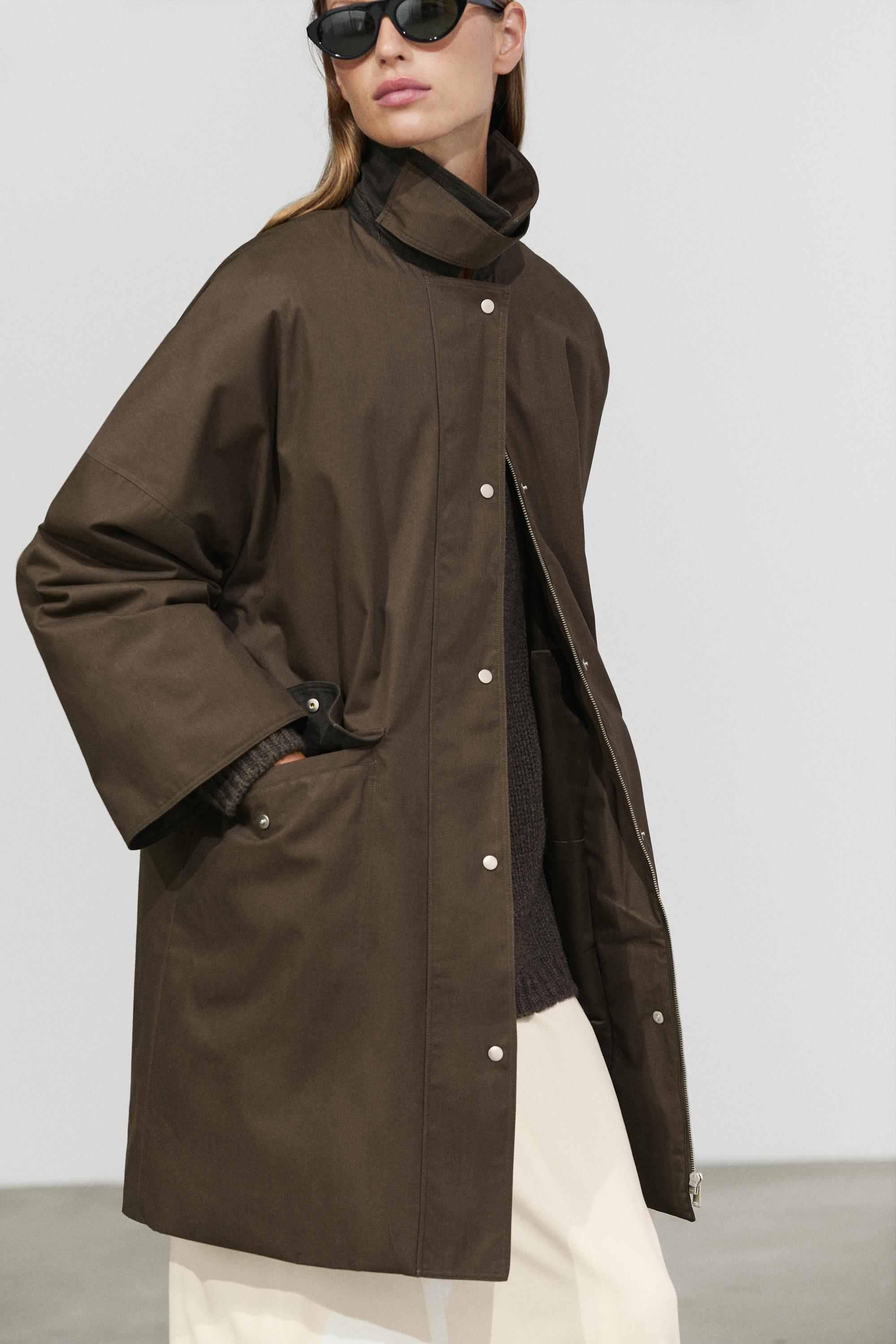Waxed-effect parka with plaid lining